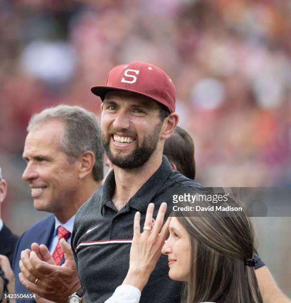 Former Stanford Cardinal quarterback Andrew Luck is honored for his induction into the College Football Hall of Fame during a Pac-12 college football...