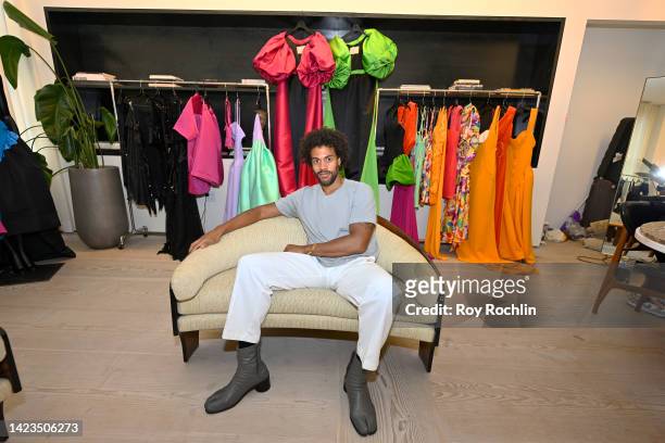 Desinger Charles Harbison poses in front of his collection on display at the Black in Fashion Council Discovery Showrooms, Presented by Mailchimp at...