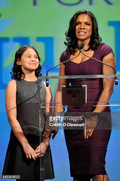 Actress Audra McDonald and daughter Zoe Madeline Donovan speak on stage during PFLAG National's 2012 Straight For Equality Awards Gala at Marriott...