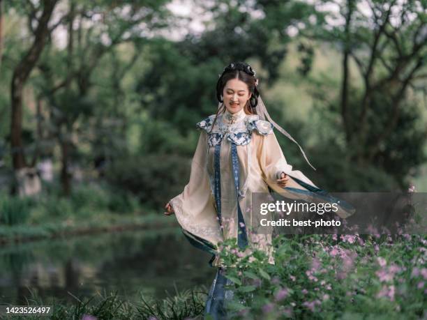 girl wearing ancient chinese clothes - bestphoto stock pictures, royalty-free photos & images