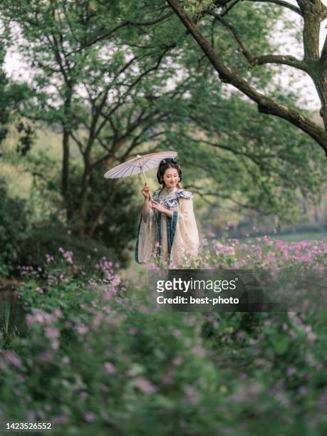 girl wearing ancient chinese clothes - bestphoto stock pictures, royalty-free photos & images