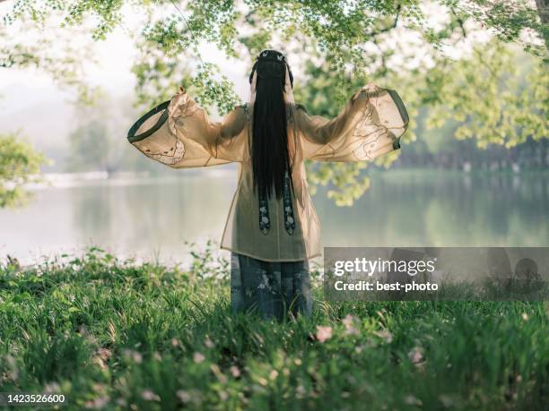 girl wearing ancient chinese clothes - bestphoto stock pictures, royalty-free photos & images