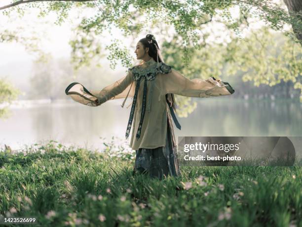 girl wearing ancient chinese clothes - bestphoto stock pictures, royalty-free photos & images