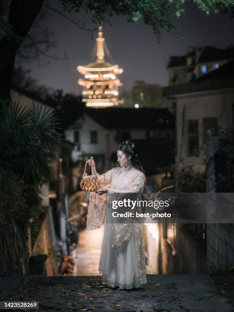 girl wearing ancient chinese clothes - hangzhou stock pictures, royalty-free photos & images