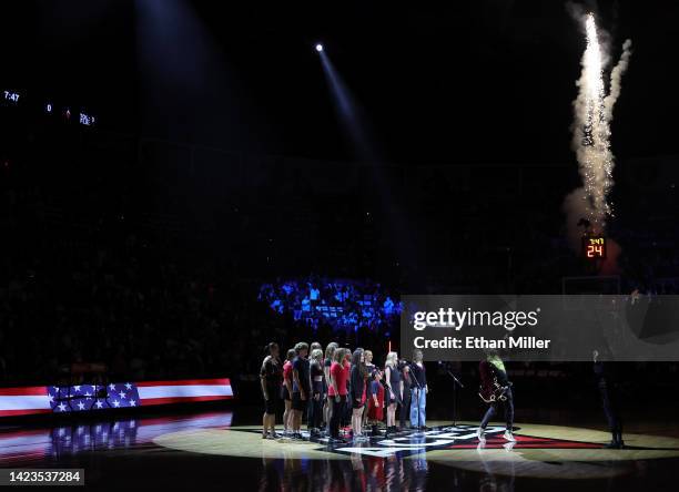 Entertainer Alex Boyé sings the American national anthem with a choir before Game Two of the 2022 WNBA Playoffs finals between the Connecticut Sun...