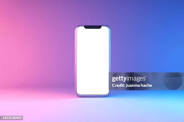 smartphone on pink background for display product or text - smartphone mockup stock-fotos und bilder