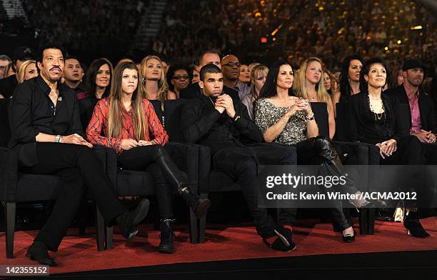 Singer Lionel Richie, Sofia Richie, Miles Brockman Richie, and Diane Alexander attend the Lionel Richie and Friends in Concert presented by ACM held...
