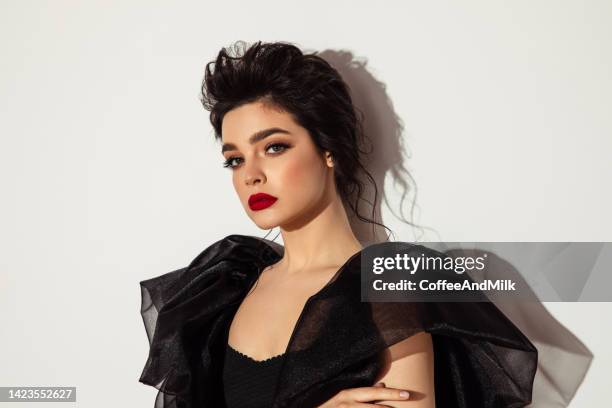 beautiful emotional woman with perfect make-up - red lipstick stock pictures, royalty-free photos & images