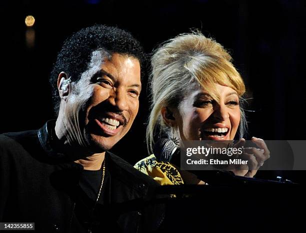 Musician Lionel Richie and his daughter Nicole Richie perform onstage during Lionel Richie and Friends in Concert presented by ACM held at the MGM...