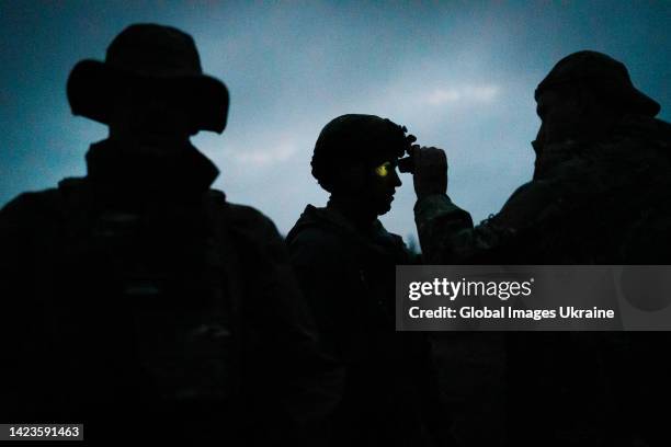 Ukrainian military member looking in a thermal weapon sight during advanced training in military tactics on September 11, 2022 in Kyiv Oblast,...