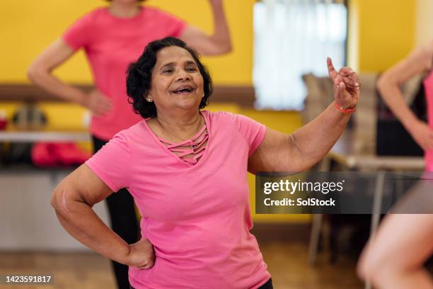 young at heart - zumba stock pictures, royalty-free photos & images