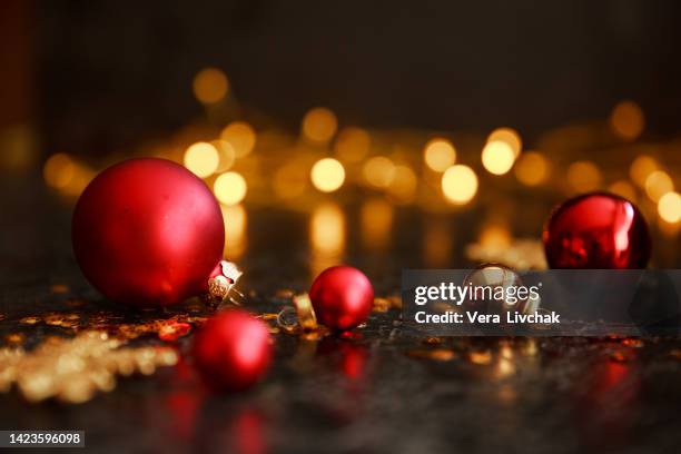 christmas tree, red balloons , christmas box and fireplace on wooden background - green christmas background stock pictures, royalty-free photos & images