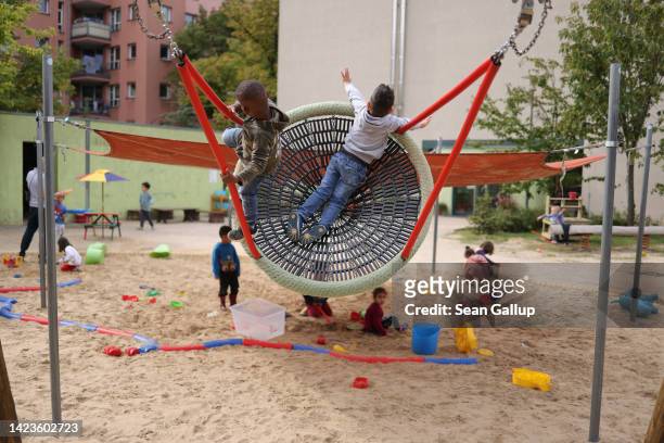 Children play outside in the playground at the Kleiner Fratz child daycare center in Neukoelln on September 14, 2022 in Berlin, Germany. Child...