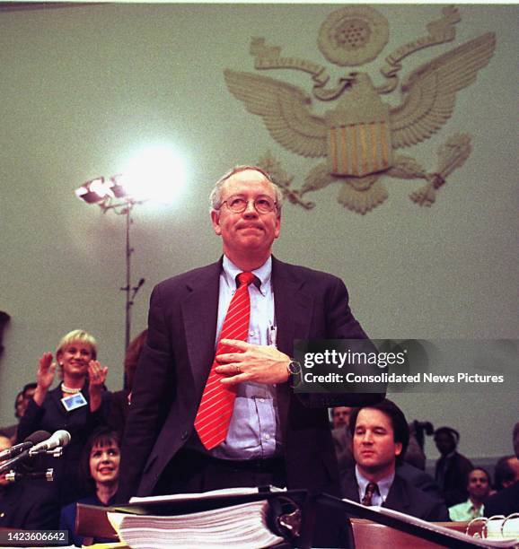 Independent Counsel Kenneth W Starr is applauded following his testimony before a US House Judiciary Committee hearing, Washington DC, November 19,...