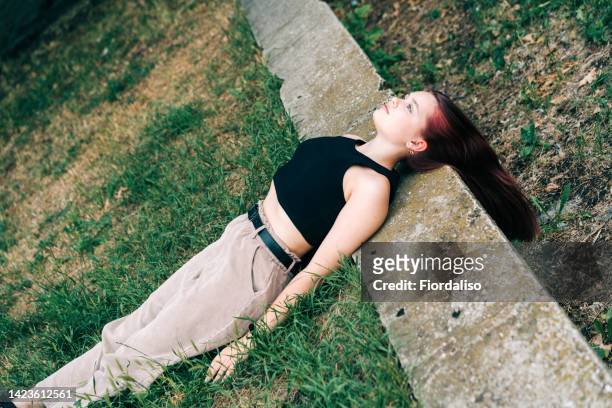 portrait of a young teenage girl in the nature - good; times bad times stock pictures, royalty-free photos & images