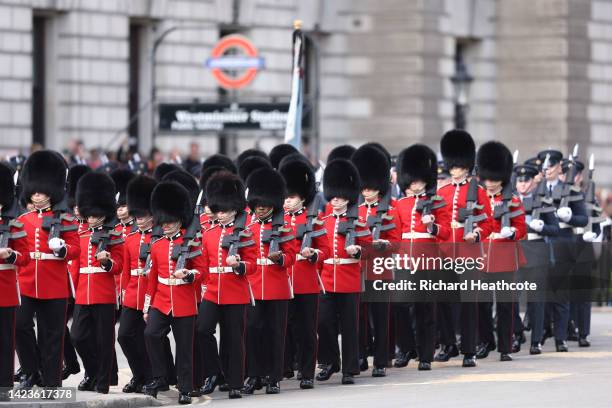 The Coldstream Guards are seen near Buckingham Palace during the procession for the Lying-in State of Queen Elizabeth II on September 14, 2022 in...
