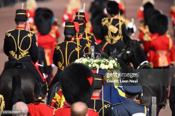 The coffin carrying Queen Elizabeth II makes its way along The Mall during the procession for the Lying-in State of Queen Elizabeth II on September...