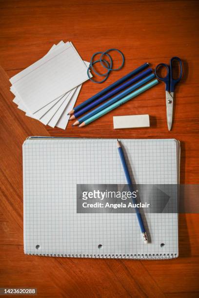 school supply still life with blue pencils - angela auclair stock pictures, royalty-free photos & images