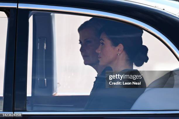 Sophie, Countess of Wessex and Meghan, Duchess of Sussex are driven in a car during the procession for the Lying-in State of Queen Elizabeth II on...