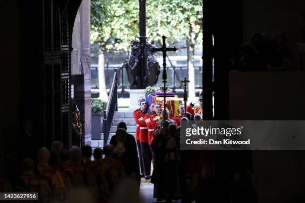 The coffin of Queen Elizabeth II is carried into Westminster Hall for the Lying-in State on September 14, 2022 in London, England. Queen Elizabeth...