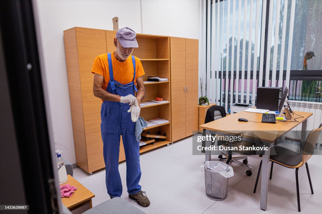 Janitor preparing for disinfection