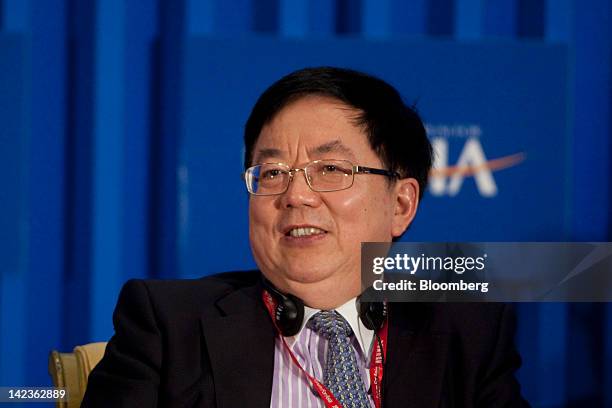 Li Jiange, chairman of China International Capital Corp., attends a session at the Boao Forum for Asia in Boao, Hainan Province, China, on Tuesday,...