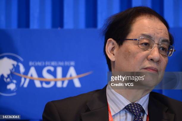 Liu Mingkang, former chairman of the China Banking Regulatory Commission , attends a session during the Boao Forum For Asia Annual Conference 2012 at...
