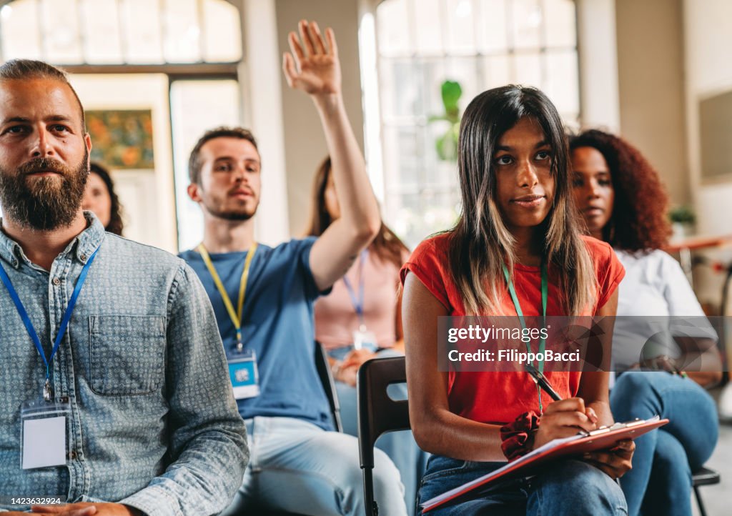 Group of people sitting during a meeting