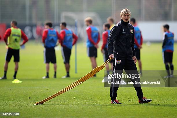 Interim coach Sami Hyypia of Leverkusen walks on the pitch during a training session at the Bayer 04 Leverkusen training ground on April 3, 2012 in...