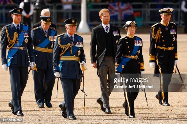 Prince William, Prince of Wales, Sir Timothy Laurence, Prince Harry, Duke of Sussex, King Charles III, Mr Peter Phillips, Anne, Princess Royal walk...