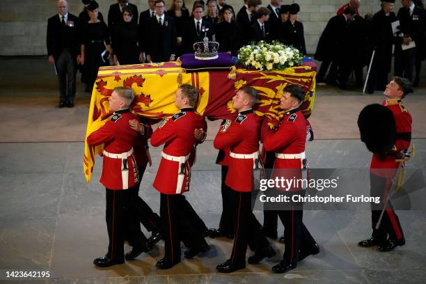 The Coffin of Queen Elizabeth II is carried into The Palace of Westminster during the procession for the Lying-in State of Queen Elizabeth II on...