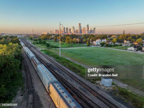 In an aerial view, a freight train is seen traveling through Houston on September 14, 2022 in Houston, Texas. Railroads across the country are...