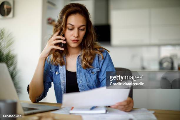 woman complaining on the phone - insurance bildbanksfoton och bilder