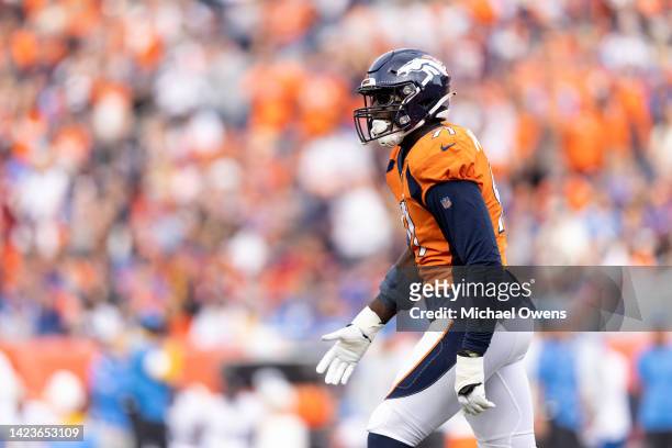 Stephen Weatherly of the Denver Broncos celebrates after sacking Justin Herbert of the Los Angeles Chargers during the second half of an NFL football...