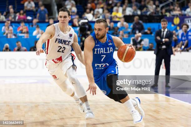 Stefano Tonut of Italy in action against Terry Tarpey of France during the FIBA EuroBasket 2022 quarterfinal match between France v Italy at...