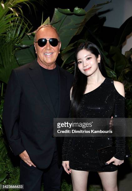 Michael Kors and Dahyun attend the Michael Kors Collection Spring/Summer 2023 Runway Show on September 14, 2022 in New York City.