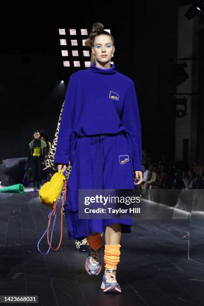 Model walks the runway during the PUMA presents Futrograde fashion show during New York Fashion Week at Cipriani 25 Broadway on September 13, 2022 in...