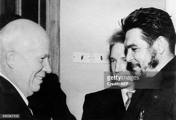 This 1962 photo shows Argentine-born legendary revolutionary figure Ernesto "Che" Guevara greeting Nikita Khrushchev , leader of the then-Soviet...