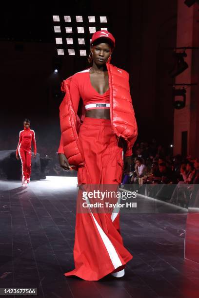 Model walks the runway during the PUMA presents Futrograde fashion show during New York Fashion Week at Cipriani 25 Broadway on September 13, 2022 in...