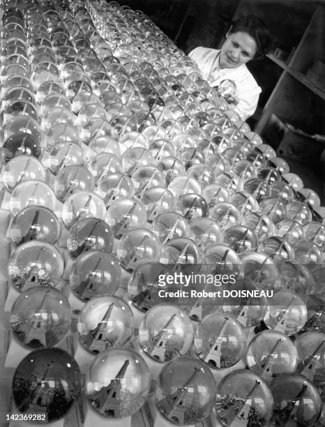 Snow globes of the Eiffel Tower, Paris, France in 1949.
