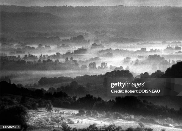 The mists in the valley seen from Loubressac in the Lot department, France.