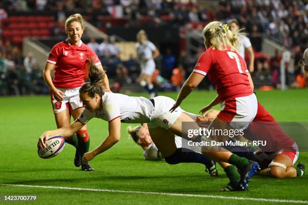 Emily Scarratt of England goes over to score their side's second try during the Women's International rugby match between England Red Roses and Wales...