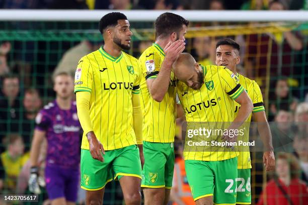 Teemu Pukki of Norwich City celebrates scoring his sides second goal with Grant Hanley during the Sky Bet Championship match between Norwich City and...