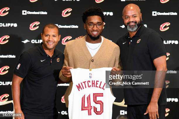 Cleveland Cavaliers president of basketball operations Koby Altman, Donovan Mitchell and head coach J. B. Bickerstaff pose for a photo during a press...