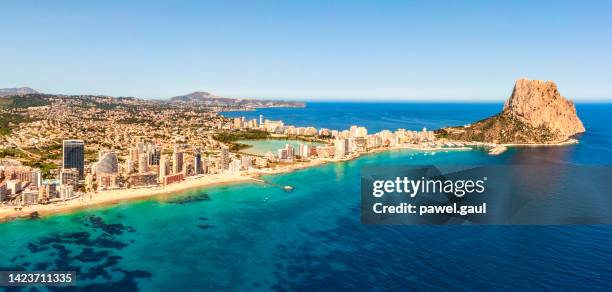 aerial view of calp city with beach and ifach rock in costa blanca spain - comunidad autonoma de valencia stock pictures, royalty-free photos & images