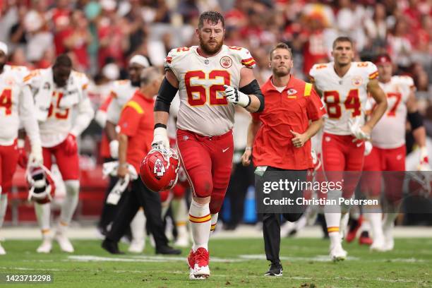 Guard Joe Thuney of the Kansas City Chiefs runs off the field during the NFL game at State Farm Stadium on September 11, 2022 in Glendale, Arizona....