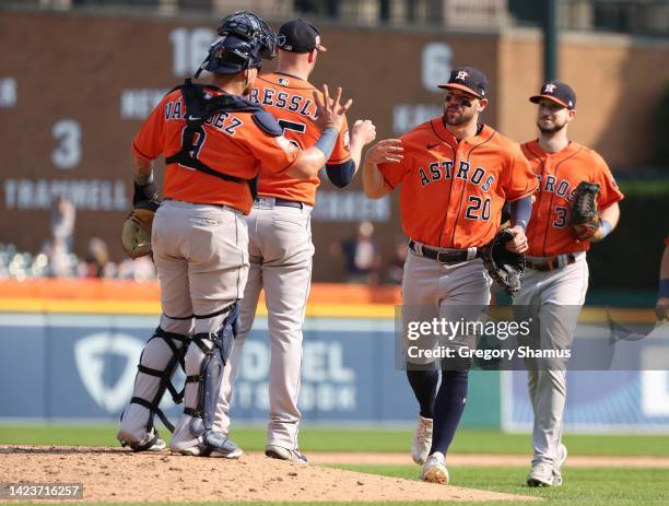 Chas McCormick and Jeremy Pena of the Houston Astros celebrates a 2-1 win over the Detroit Tigers with teammates at Comerica Park on September 14,...