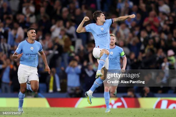 John Stones of Manchester City celebrates after scoring their sides first goal during the UEFA Champions League group G match between Manchester City...