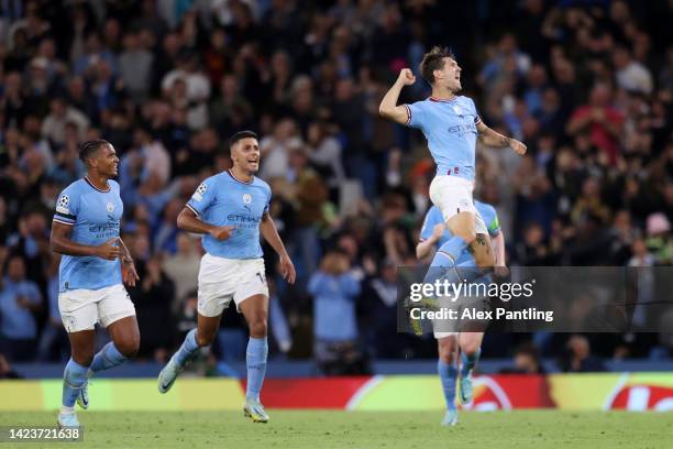 John Stones of Manchester City celebrates after scoring their sides first goal during the UEFA Champions League group G match between Manchester City...