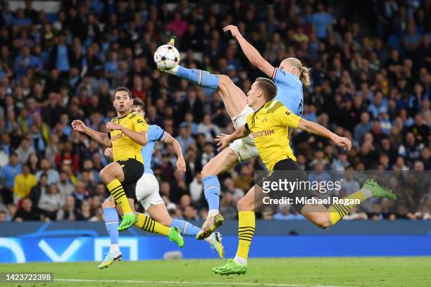 Erling Haaland of Manchester City scores their sides second goal during the UEFA Champions League group G match between Manchester City and Borussia...